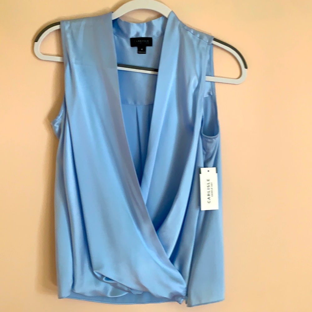 Beautiful 100% silk top. Carlisle.Crossover neckline.Gorgeous blue.Never worn.